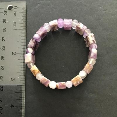 Sale Photo Thumbnail #112: Very nice polished stone stretchy bracelet. Please see attached photos.