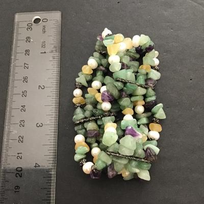 Sale Photo Thumbnail #130: Beautiful, multicolored, polish stone stretchy bracelet. Please see attached photos.