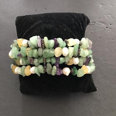 Sale Photo Thumbnail #129: Beautiful, multicolored, polish stone stretchy bracelet. Please see attached photos.