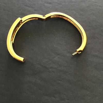 Sale Photo Thumbnail #156: Gold tone bracelet with rhinestone hinged. Please see attached photos.