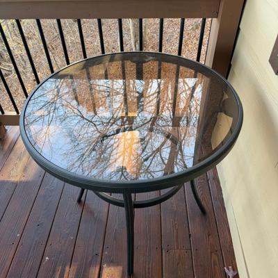 Sale Photo Thumbnail #1087: Black Aluminum Outdoor Round Table with Glass Top  30" wide X 28" Tall