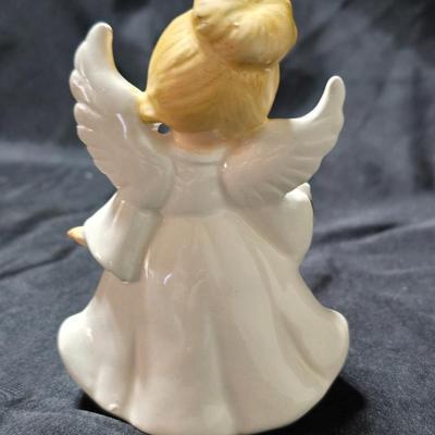 Vintage Lefton July Birthday Angel figurine, style #6224, featuring a ruby-red birthstone and blue flowers.