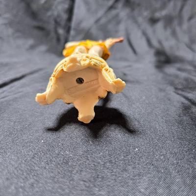 Vintage Fontanini Depose Italy cherub figurine, one standing and playing a violin, the other reclining with a floral garland.