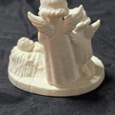 Goebel Hummel HX 312 Angels with Baby Jesus figurine in white bisque porcelain. It was produced in 1961 in West Germany