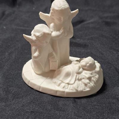 Goebel Hummel HX 312 Angels with Baby Jesus figurine in white bisque porcelain. It was produced in 1961 in West Germany