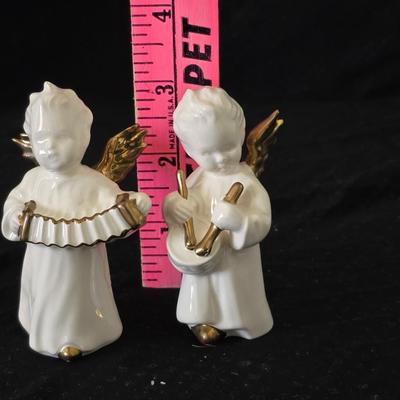 Vintage Goebel porcelain angel figurineS with gold accents, playing an accordion and drum.