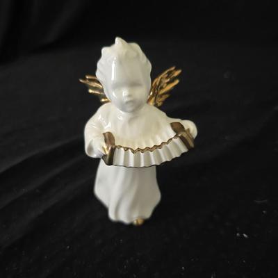 Vintage Goebel porcelain angel figurineS with gold accents, playing an accordion and drum.