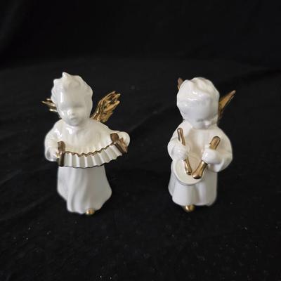Vintage Goebel porcelain angel figurineS with gold accents, playing an accordion and drum.