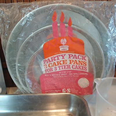 Bake ware = New Best Party pack 3 cake pan - 3 tiered cakes - Foly muffin tins - New Oneida 8" square cake pan and a large cake pan