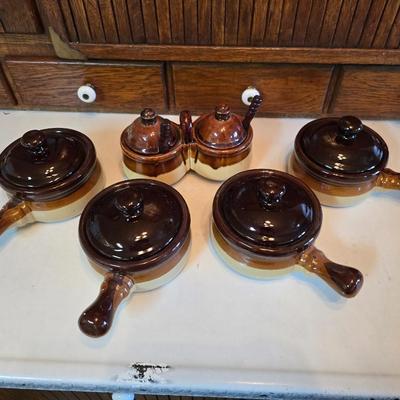 ceramic French onion soup bowls / lidded crocks, and a matching double salt and pepper shaker set.