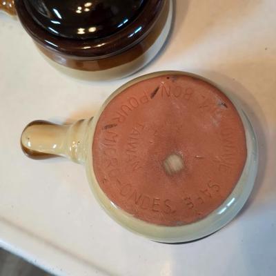 ceramic French onion soup bowls / lidded crocks, and a matching double salt and pepper shaker set.