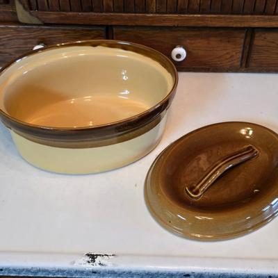 Vintage T.G. Green Granville oval bean pot casserole dish with a lid, featuring a two-tone brown and beige/cream glaze.