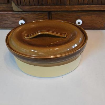 Vintage T.G. Green Granville oval bean pot casserole dish with a lid, featuring a two-tone brown and beige/cream glaze.