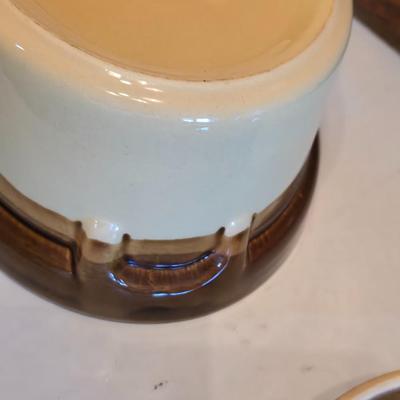 Vintage T.G. Green Granville oval bean pot casserole dish with a lid, featuring a two-tone brown and beige/cream glaze.