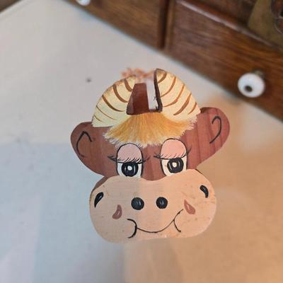 Large unmarked Gourmet Brown drip glaze mixing bowl with a variety of cute brown cows!