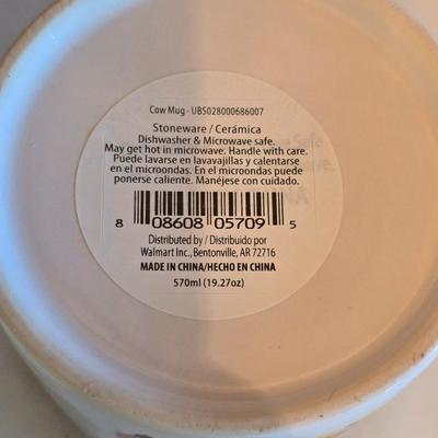 Large unmarked Gourmet Brown drip glaze mixing bowl with a variety of cute brown cows!