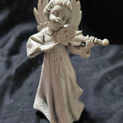 Three vintage Fontanini angel musician figurines, marked "Depose Italy" with a spider mark