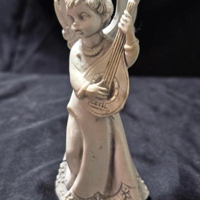 Three vintage Fontanini angel musician figurines, marked "Depose Italy" with a spider mark