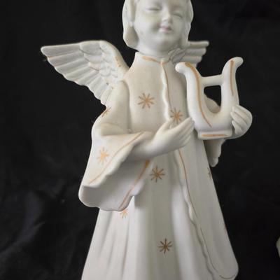Pair of Schmid Brothers porcelain angel candle holders