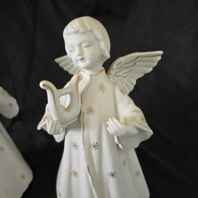 Pair of Schmid Brothers porcelain angel candle holders