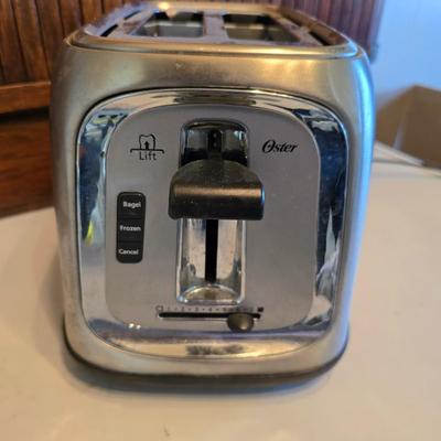 Tea & Toast - Oster two slice chrome toaster - and a chrome stainless tea/water kettle