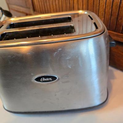 Tea & Toast - Oster two slice chrome toaster - and a chrome stainless tea/water kettle