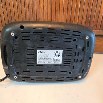 Tea & Toast - Oster two slice chrome toaster - and a chrome stainless tea/water kettle