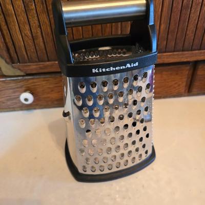 Kitchen gadgets - cutters, slicers and dicers with a strainer and a chrome flour sifter