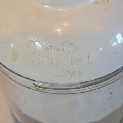 Kitchen gadgets - cutters, slicers and dicers with a strainer and a chrome flour sifter