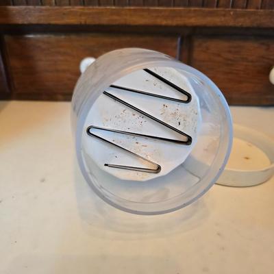 Kitchen gadgets - cutters, slicers and dicers with a strainer and a chrome flour sifter