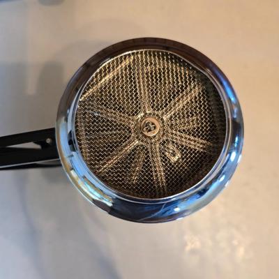 Kitchen gadgets - cutters, slicers and dicers with a strainer and a chrome flour sifter