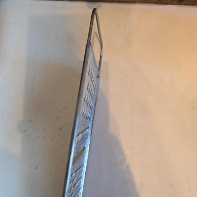 Kitchen gadgets - cutters, slicers and dicers with a strainer and a chrome flour sifter