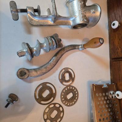 Kitchen gadgets = stainless steel spaetzle maker -Climax manual food and meat chopper and a vintage metal, box-style cheese grater