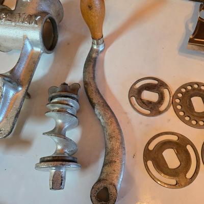 Kitchen gadgets = stainless steel spaetzle maker -Climax manual food and meat chopper and a vintage metal, box-style cheese grater