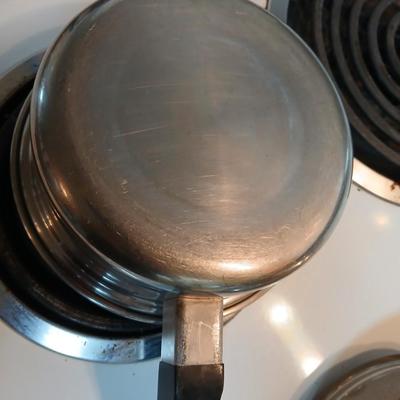 Three - piece Saladmaster surgical stainless steel waterless cookware