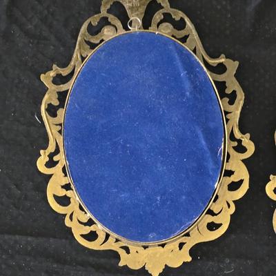 pair of vintage Italian floral still life prints in ornate brass-toned metal frames with convex, or bubble, glass.