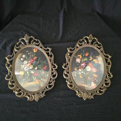 pair of vintage Italian floral still life prints in ornate brass-toned metal frames with convex, or bubble, glass.