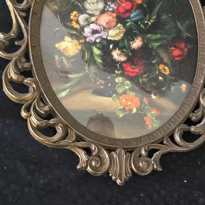pair of vintage Italian floral still life prints in ornate brass-toned metal frames with convex, or bubble, glass.