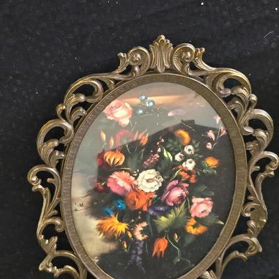 pair of vintage Italian floral still life prints in ornate brass-toned metal frames with convex, or bubble, glass.