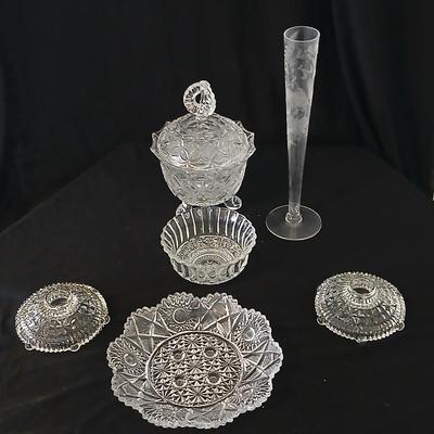 Assortment of glassware - Etched Daffodil Vase, Bowls, candy dish, Candle stick holders
