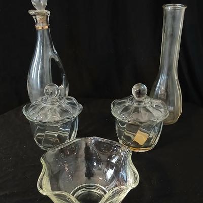 Glassware- two heavy glass lidded dishes, a Cruet with stopper, a bowl and a vase