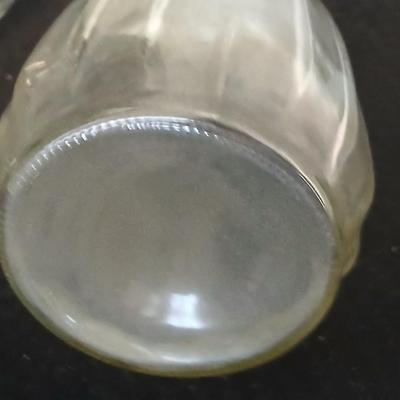 Glassware- two heavy glass lidded dishes, a Cruet with stopper, a bowl and a vase