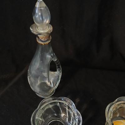 Glassware- two heavy glass lidded dishes, a Cruet with stopper, a bowl and a vase