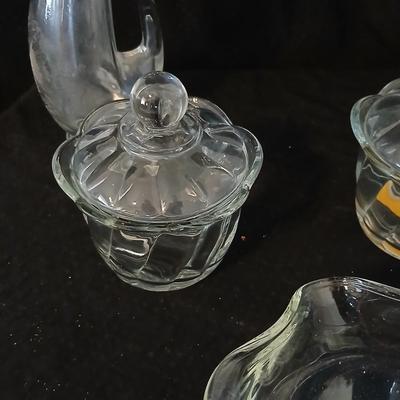 Glassware- two heavy glass lidded dishes, a Cruet with stopper, a bowl and a vase