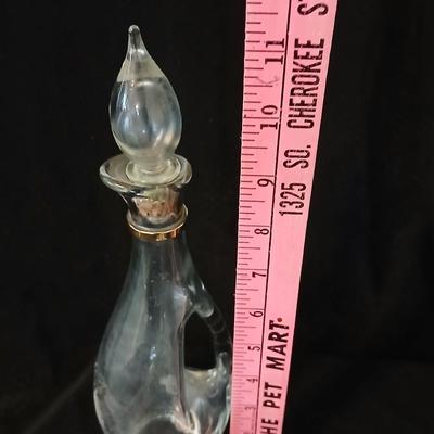 Glassware- two heavy glass lidded dishes, a Cruet with stopper, a bowl and a vase