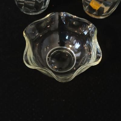 Glassware- two heavy glass lidded dishes, a Cruet with stopper, a bowl and a vase