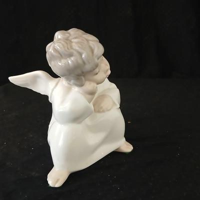 Lladro "Angel Thinking" porcelain figurine, model number 4539