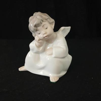 Lladro "Angel Thinking" porcelain figurine, model number 4539