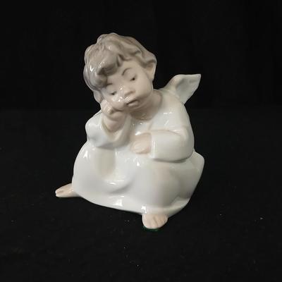 Lladro "Angel Thinking" porcelain figurine, model number 4539