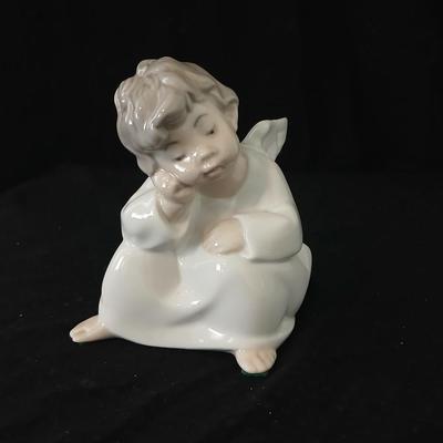 Lladro "Angel Thinking" porcelain figurine, model number 4539